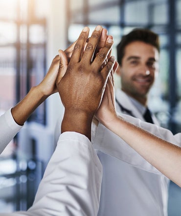 Quality Improvement - Care Team Hands